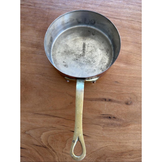 Authentic French copper sauté pan stamped “VILLEDIEU ML FRANCE.” Made in Villedieu-les-Poêles, Normandy — the historic...