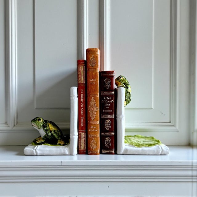 A delightful pair of mid-century Italian ceramic bookends, circa 1950s–1960s, stamped Made in Italy. Each bookend features...