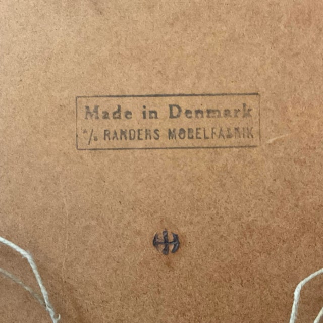 Mid Century Teak Wall Mirror by Randers Fabernik with a Holmgaard hand blown green vase by Per Lutken. It measures23 5/8”L...