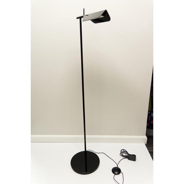 The Flos Tab LED Floor Lamp was designed by Edward Barber and Jay Osgerby to add bright, adjustable lighting and slick...