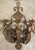More information coming soon… A set of four French sconces in iron, detailed with tole leaves with a distressed gilt...