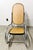 A Bauhaus style Marcel Breuer attributed rocking chair featuring chromed tubular frame and caned seat and backrest. Unmarked.