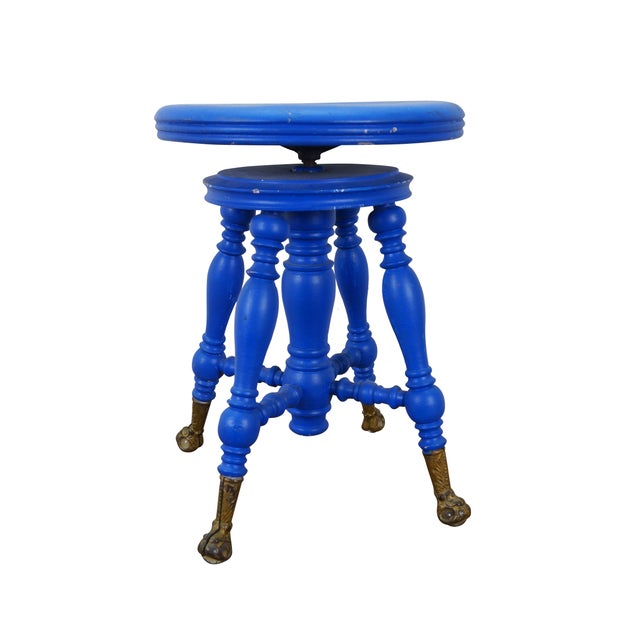 Late 19th century Victorian era piano stool - round top with turned stretchers and legs, capped with patterned brass claw...