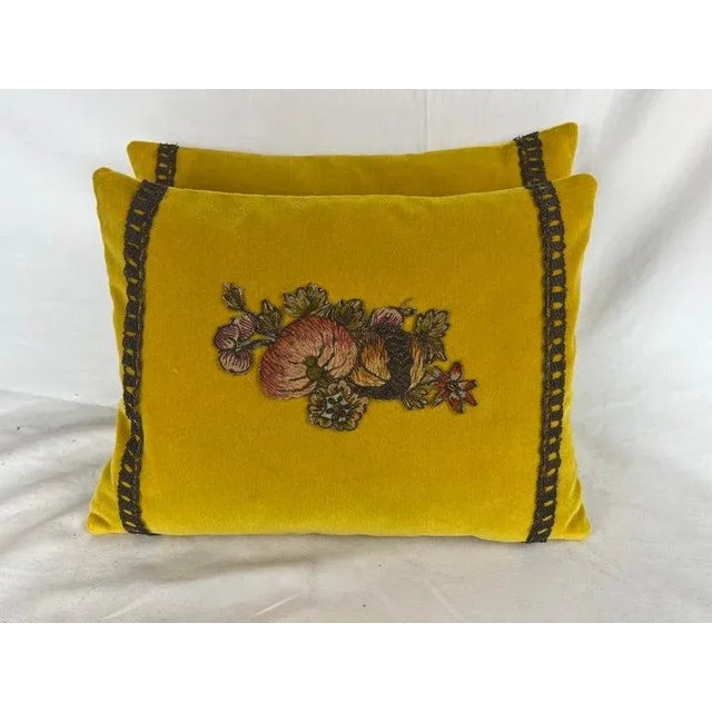 Pair of custom pillows made with 19th century French metallic & chenille floral appliques. The appliques were placed on a...