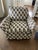 Comfortable armchair. Extra large, some might say "chair and a half". Slip covered in "diamond" pattern. Slightly used; no...