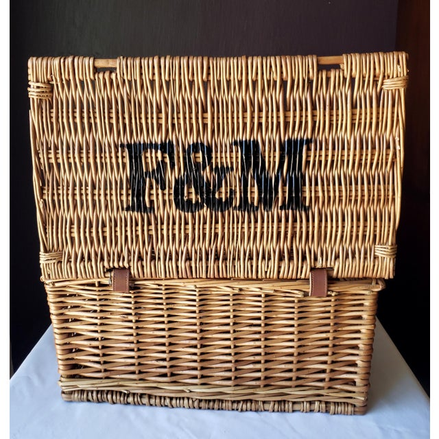 An iconic mid-century style British wicker picnic hamper from the historic London purveyor Fortnum & Mason. Crafted from...