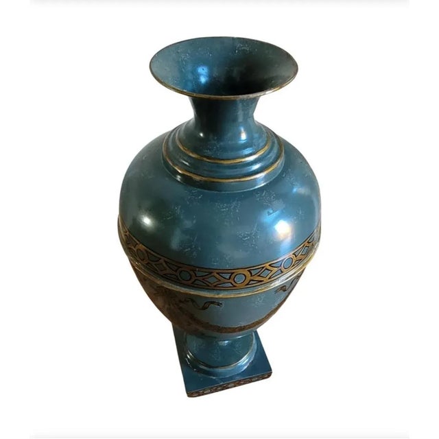 A charming pair of hand-painted metal vases by Interior Concepts. Felt lined bottom. Measure 9" in diameter and stand...