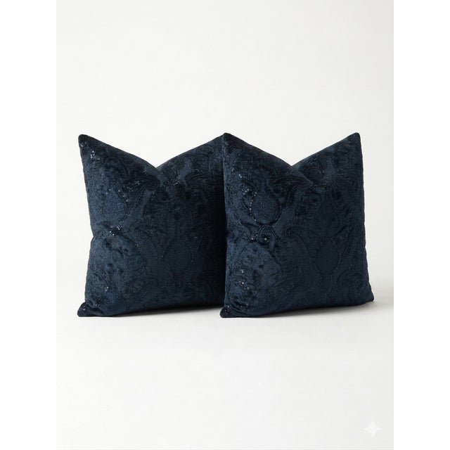 Handcrafted from luxurious navy blue tonal embroidered velvet, featuring an elegant paisley and floral damask design with...