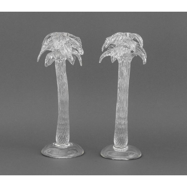 Pair of Murano Clear Art Glass Palm Tree Candlesticks. 15.25" H x 6.25" Diameter. Provenance: From a Fort Lauderdale,...