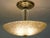 A dramatic and impressive Art Deco Modern Lalique Style Slag molded Saucer shaped form hanging ceiling lamp designed and...