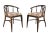 A sexy pair of 1960s walnut wishbone-form accent chairs perfectly sized for any space. With beautiful curves, a striking...