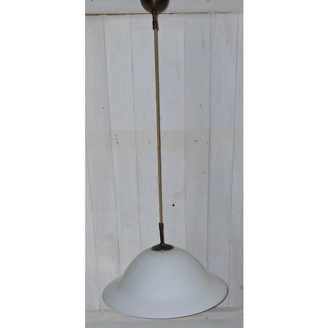 Vintage Ceiling Lamp with White Curved Glass Shade on Brass Mount, 1970s, in Very Good conditions. Designed 1970 to 1979...