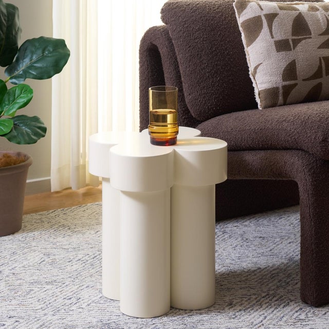 Discover the charm of the Bastien accent table in a soft ivory hue, handcrafted from quality wood to blend seamlessly with...