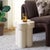 Discover the charm of the Bastien accent table in a soft ivory hue, handcrafted from quality wood to blend seamlessly with...