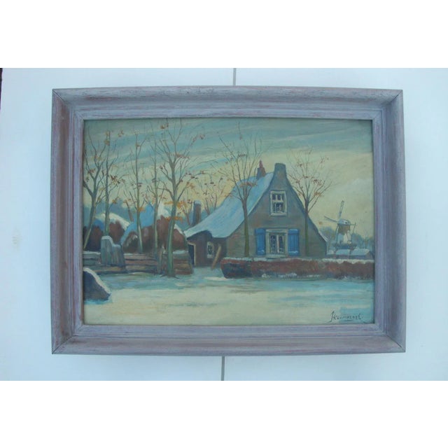 Vintage oil on panel landscape painting of a Dutch cottage, haystacks, and windmill under snow. Circa 1930. Signed on...