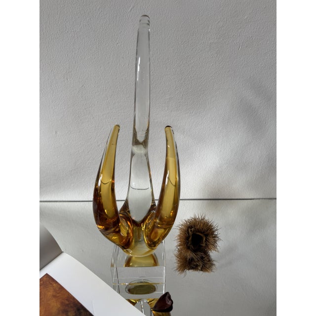 A refined Italian art glass sculpture capturing light, movement and elegance – perfect as a statement piece or collectible...
