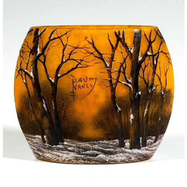 Slightly bulbous vase on a flush oval base, colourless glass with flaky yellow-orange and brownish powder inclusions,...