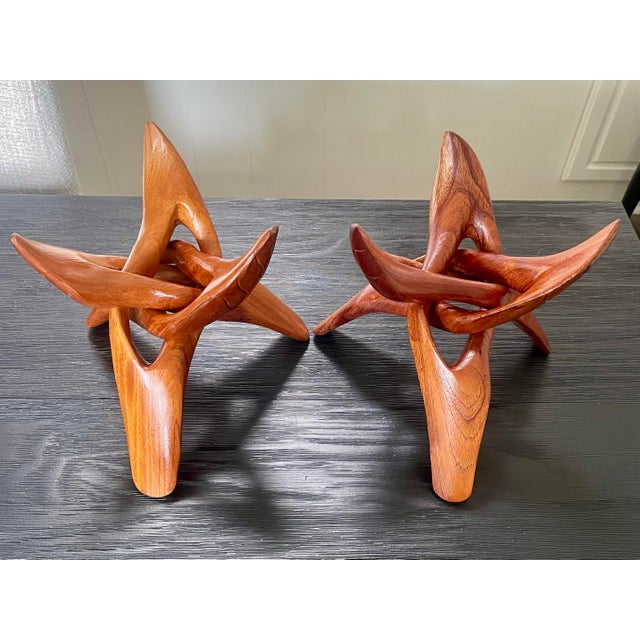 Pair of vintage 1960s tripod Teak-wood display stands. Carved entirely from one piece of Teak-wood. Ideal for Decorative...