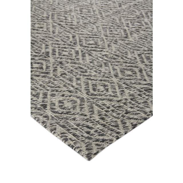 Texture, pattern, color! Handmade with 100% New Zealand wool, the beautiful geometric design of the Sanz rug make it ideal...