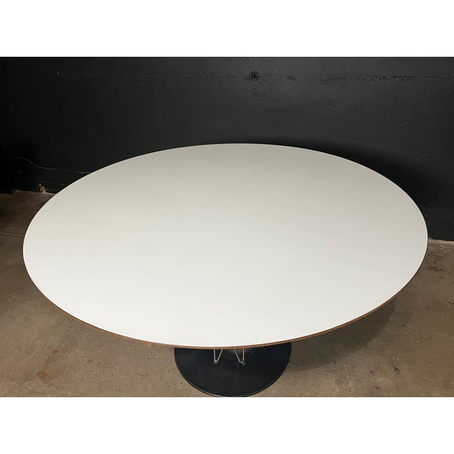 The 47.5-inch Isamu Noguchi Cyclone dining table by Knoll is a rare and iconic piece, showcasing a harmonious blend of...