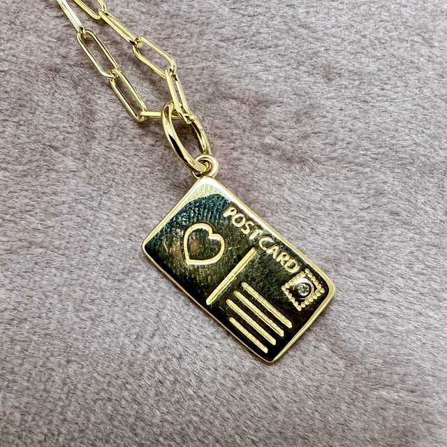 Created in 18 karat yellow gold Diamonds 0.005 carat approx. Chain sold separately About the Designers ~ Dharmesh &...