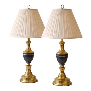 1970s Pair of Hollywood Regency Polished Brass Table Lamps With Navy Accents — Elaine R. Estate For Sale