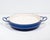 A blue enamel paella pan designed by the Danish designer Jens Quistgaard (1919-2008) for Dansk International Designs. This...