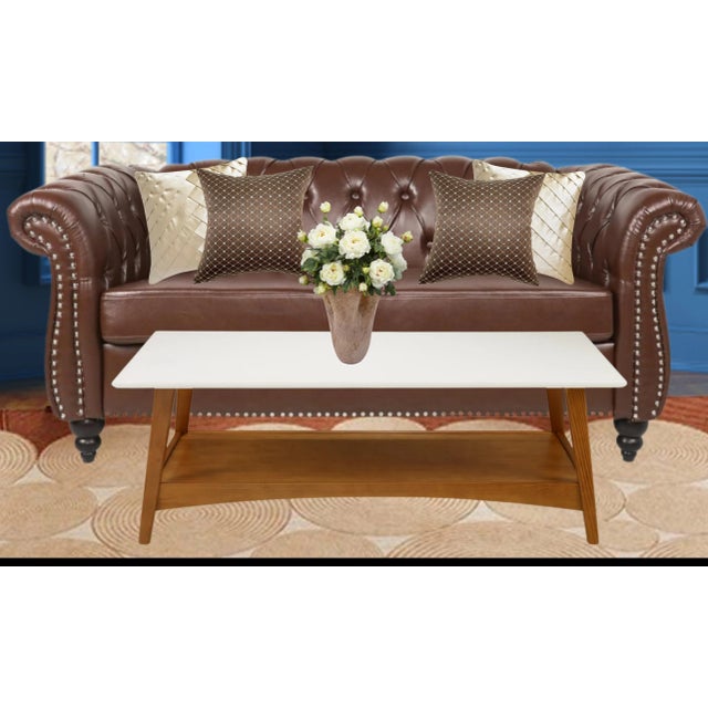 This 9 inch tall art glass vase by Krosno Jozefina was hand blown using earth-toned hued glass. It expands upward from the...