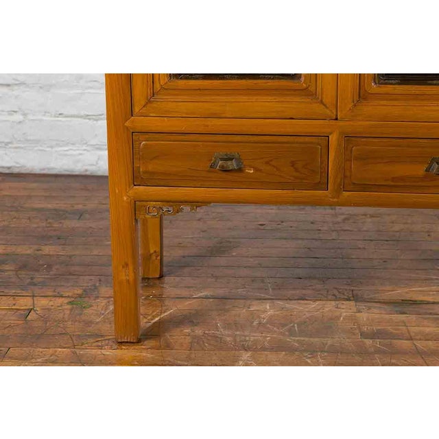 Mid 20th Century Chinese Early 20th Century Lacquered Armoire With Gilt Carved Warrior Motifs For Sale - Image 5 of 18