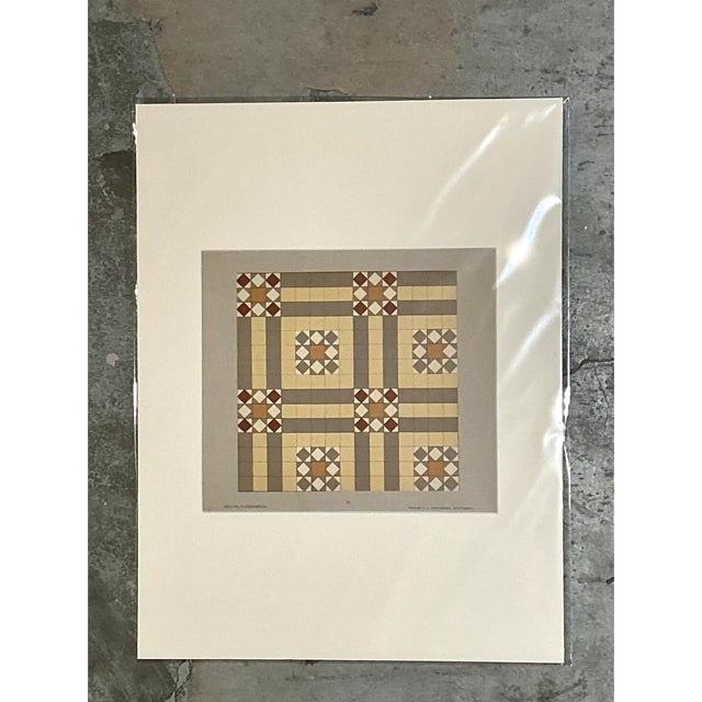 This vintage mid-century modern serigraph on paper features an intricate geometric tile pattern that gracefully evokes the...