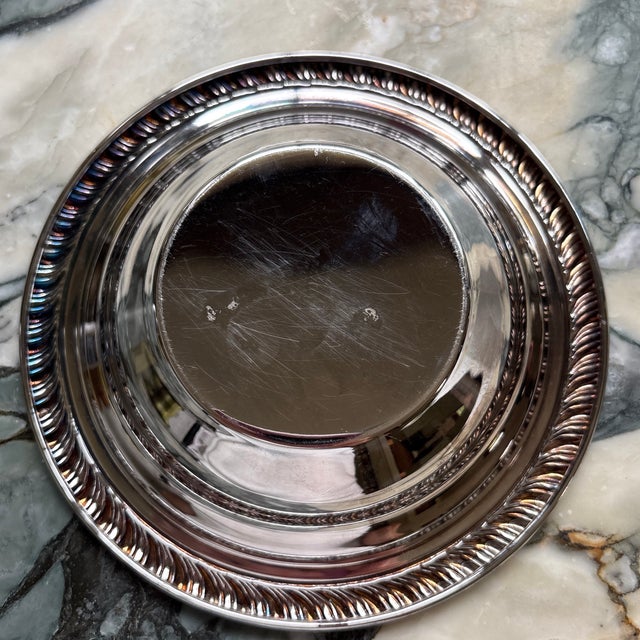 Vintage silver plate dish measuring 6.5” Diameter and 1.5” high. Rope edge rim. Not marked. Cute little catch all dish or...