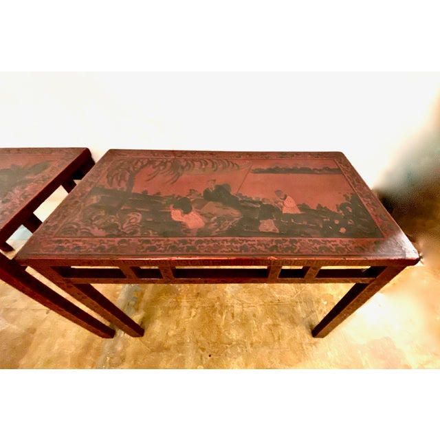 This is an unusual pair of Late Ching Chinese cinnabar-toned coromandel lacquer small altar or side tables. The tops of...