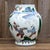 A highly decorative Chinese porcelain vase featuring vibrant famille verte and wucai decoration, combining traditional...