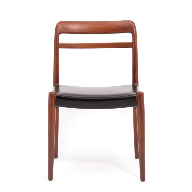 A single model 145 Danish teak dining chair designed by Alf Aarseth for Gustav Bahus. Unmarked. The chairs all are in...