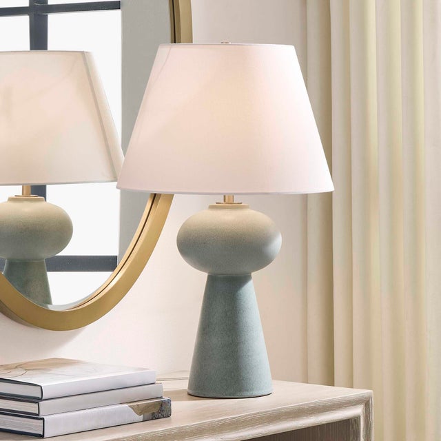 Crafted From Ceramic, This Table Lamp Is Finished In A Sophisticated Light Dusty Blue Glaze, Sporting A Delicate Speckled...