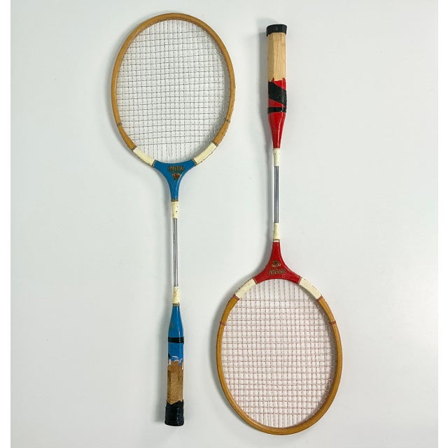 This is a fun vintage decor choice for a game room or cabana. These are a pair of Mid-Century Badminton Rackets. They are...