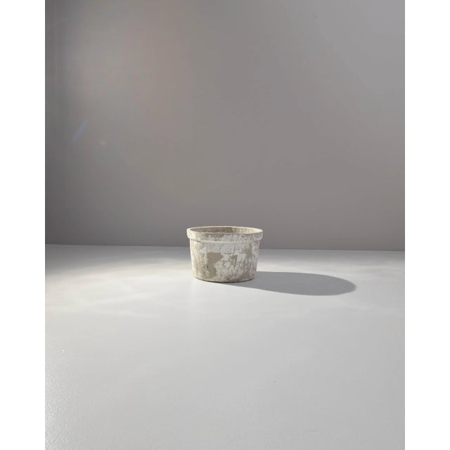 A vintage concrete planter from France, produced circa 1970. Design of the mid-century produced forms so timeless they...