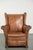 This charming vintage sheepskin wingback chair is crafted in a luxurious English style. The chair features a removable...