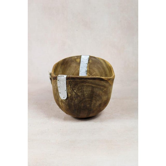 Turkana are a nomadic people from nw kenya known for skills in woodcarving and metalwork. Frequently on the move, their...