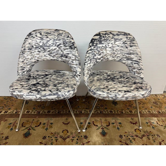 Design Plus Gallery presents a Pair of Executive Chairs by Eero Saarinen. The pair have a lustrous, abstract pattern that...