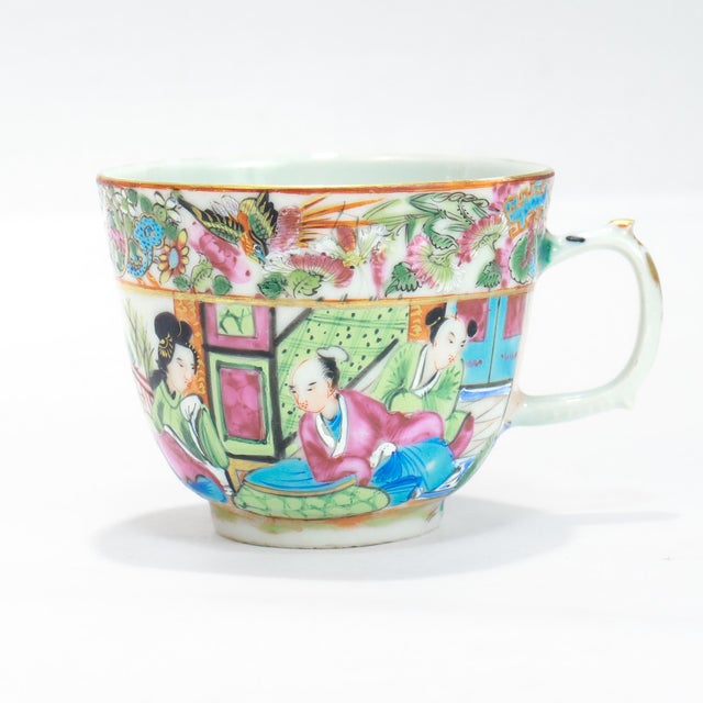 A fine antique Chinese Export Rose Mandarin porcelain cup & saucer. Each with enamel painted decoration on a white...