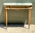 Exuding classical European charm and Neoclassical elegance, this vintage console table features an exquisite contoured...