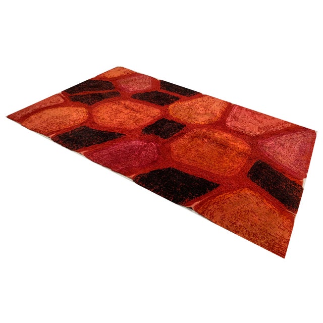 This hand-hooked wool rug from Scandinavia, dating back to circa 1960.