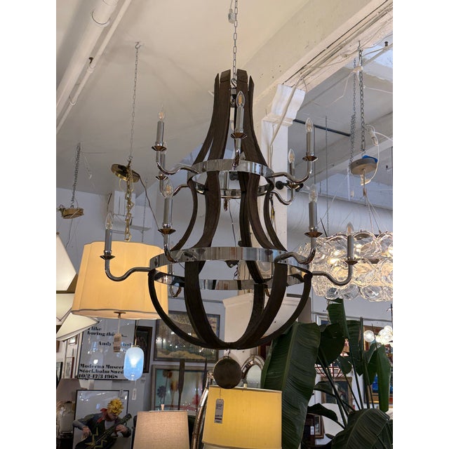 Design Plus Gallery presents the 12 Light Wine Barrel Chandelier from Restoration Hardware. Made by hand from reclaimed...
