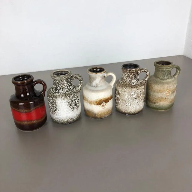 Article: Set of five fat lava art vases Model: 414-16 Producer: Scheurich, Germany Decade: 1970s These original vintage...