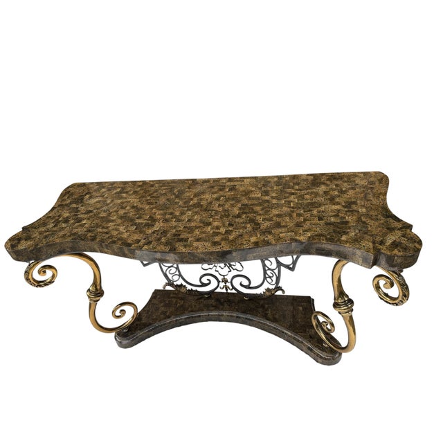 A spectacular vintage console table by Henredon, featuring a dramatically sculpted form extensively clad in hundreds of...