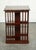 Edwardian Revolving Bookcase. The Antique Edwardian Revolving Bookcase with a Serpentine Shaped Top is a true gem from the...