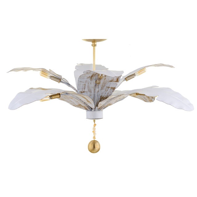 The Boca Chandelier is an elegantly modern take on vintage Florida style and captures the natural twists and turns of...