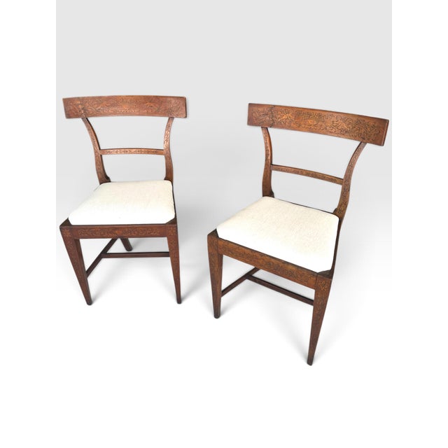 Rare Pair of Late 18th Century Directoire Penwork and Cherrywood Side Chairs, circa 1790. An exceptional, highly rare, and...