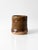 Vintage handmade studio pottery cup in a rich brown glazed finish with subtle tonal variation and an unglazed foot. The...